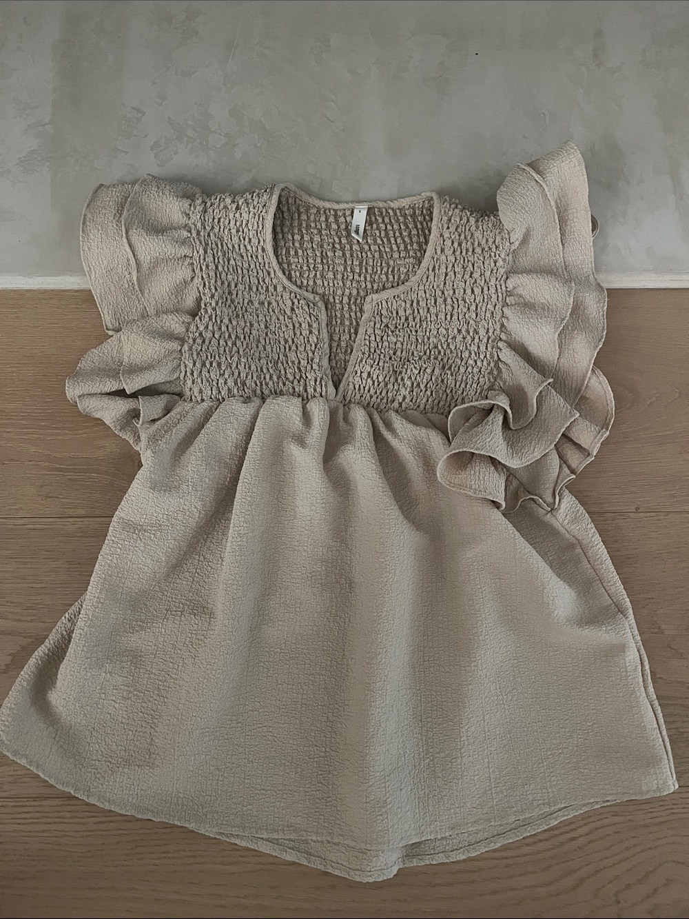 glam Taupe Smocked Knit Top with Ruffle Edge